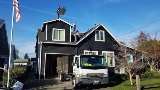 Roof installation in Maple Valley, WA with old roof being removed